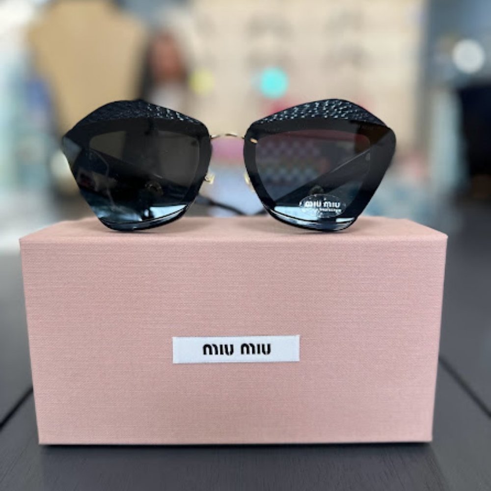 Miu Miu Charms sunglasses CHF565